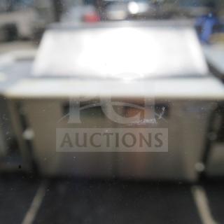 Avantco 2-door refrigerated prep table, model 178APT48MHC, with cutting board and 2 racks. Measures 47x36x46 inches.