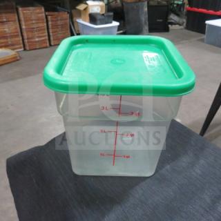 4 Quart food storage container with green lid, marked for measurements, in excellent condition. 3XBID branding visible.