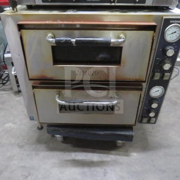 One Waring 2 Door Countertop Pizza Deck Oven. Working When Removed.  Model# WP0750. 240 Volt. 27X22X28 - Image 1 of 1