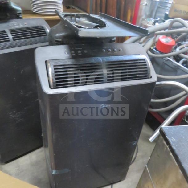 Midea portable air conditioner, model MAP12S1TGR-S, in used condition, 115 Volt, control panel visible on top.