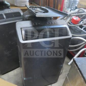 Midea portable air conditioner, model MAP12S1TGR-S, in used condition, 115 Volt, control panel visible on top.