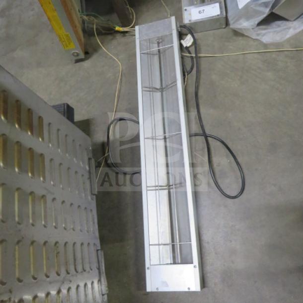 Nemco food warmer, Model 6150-36, 120 Volt, 36x6x3 inches. Features power cord, metal casing, used condition.