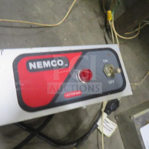 Nemco food warmer model 6150-36, 120V, 36x6x3, with power switch and indicator light. Good condition.