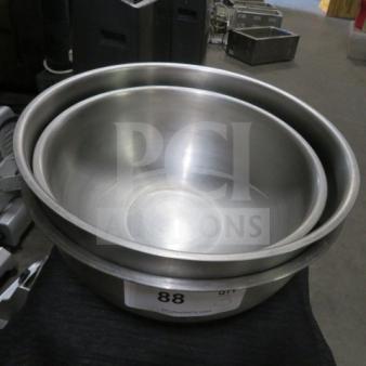 Assorted size stainless steel mixing bowls, excellent condition, numbered label "88 3XBID" visible on front bowl.