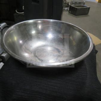 12-inch stainless steel mixing bowl, showing some wear. Model 3XBID. Ideal for kitchen use and durable.