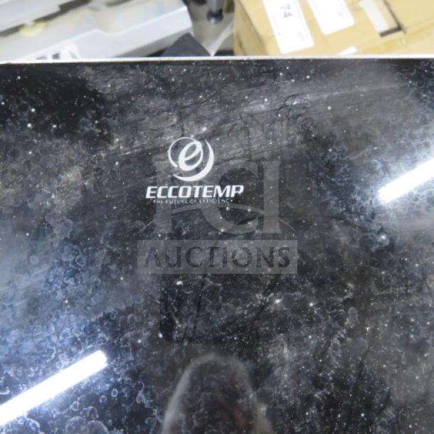 Eccotemp tankless electric water heater, model ie-11, 240V, 11000W, visible brand logo, fair condition.