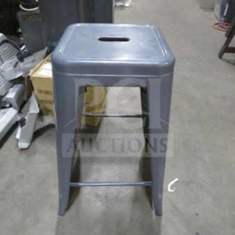 Industrial look gray metal bar stool, sturdy design, square seat with cutout handle, excellent condition.