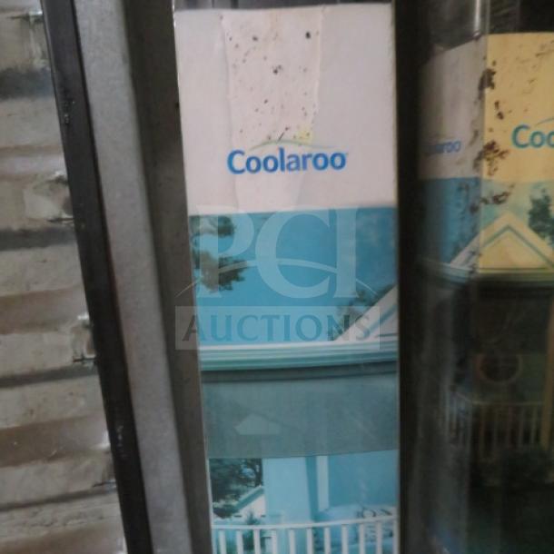 New Coolaroo wand-operated roller shade, 96x96 inches, in original packaging. White box with Coolaroo branding visible.