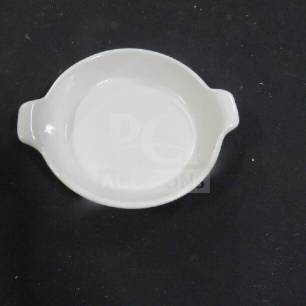 7.5-inch white ceramic pasta bowl with handles. Item code 8XBID. Excellent condition, ideal for serving.