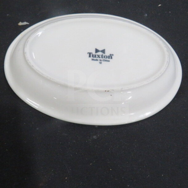 8.5x6 inch Tuxton oval plate, white, marked "Made in China" underneath, in good condition. Model 12XBID.
