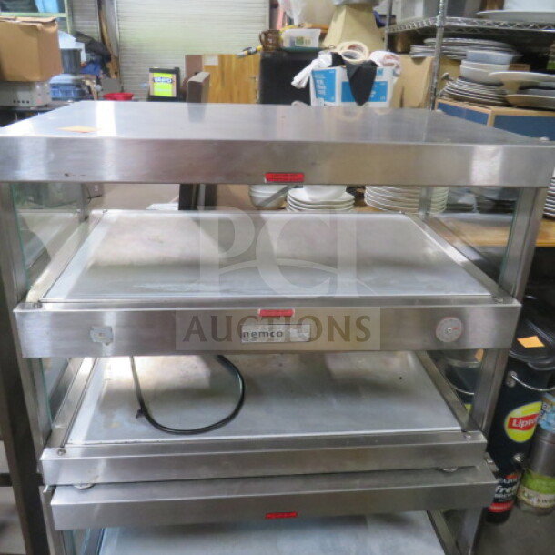 Nemco two-shelf stainless steel food warmer, 120V, 30x19.5x1.5 inches, visible label, used condition.