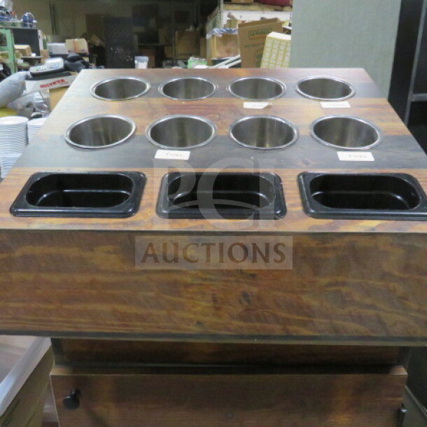 Countertop flatware organizer, 25.5x22.5x14, wood finish with metal and plastic compartments, labels for sorting.