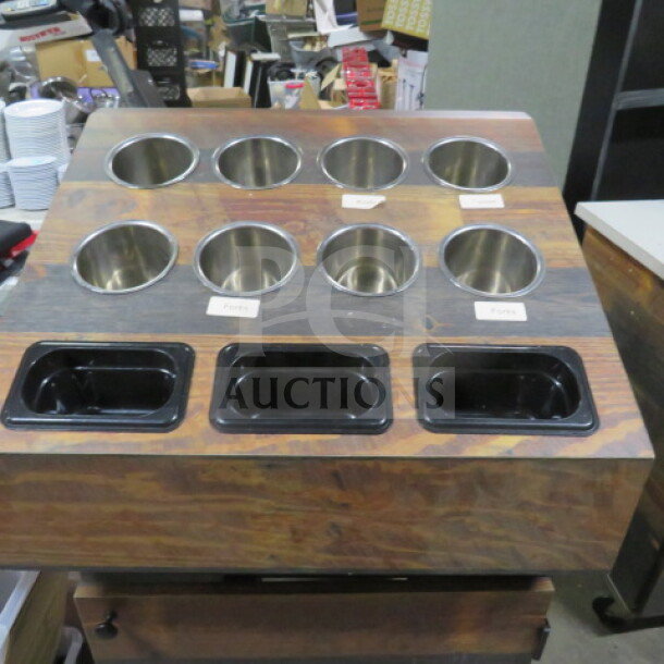 Wooden countertop flatware organizer, 25.5x22.5x14 inches, with stainless steel and plastic compartments, labeled for utensils.