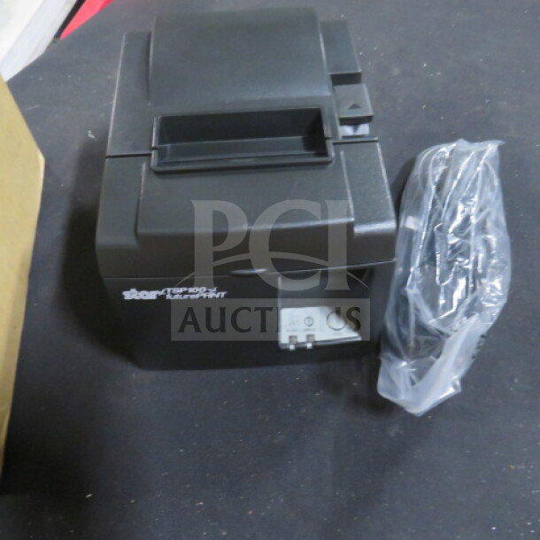 New Star TSP100 thermal printer, black, includes power cord, unopened packaging. Model# TSP100 clearly visible.