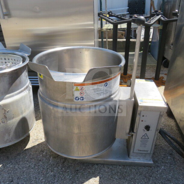 Cleveland KET12T Tilt Kettle, stainless steel, 200-208V, 26x21x26 inches, shown in used condition with control panel and safety labels.
