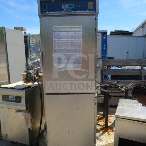 Royalton Heat And Hold Model SSRHH-2000-C4 on casters, 120V, 25.5x35.5x74.5 inches, temperature control panel visible.