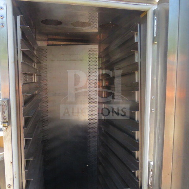 Royalton Heat and Hold oven, model SSRHH-2000-C4, on casters. Interior view with shelving, 25.5x35.5x74.5 inches, 120 volt.