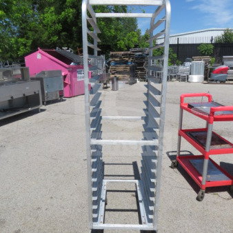 Alt text: Aluminum speed rack on casters, 20.5x27x69 inches, multiple shelves, suitable for commercial kitchen use.