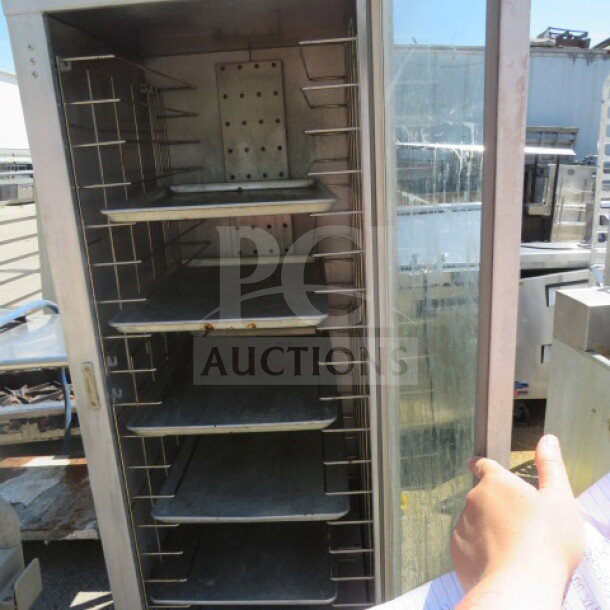 Carter Hoffman Heat and Hold, model HL3-18-33, on casters. Measures 26.5"x31"x70.5". 120 Volt, multiple shelves, used condition.
