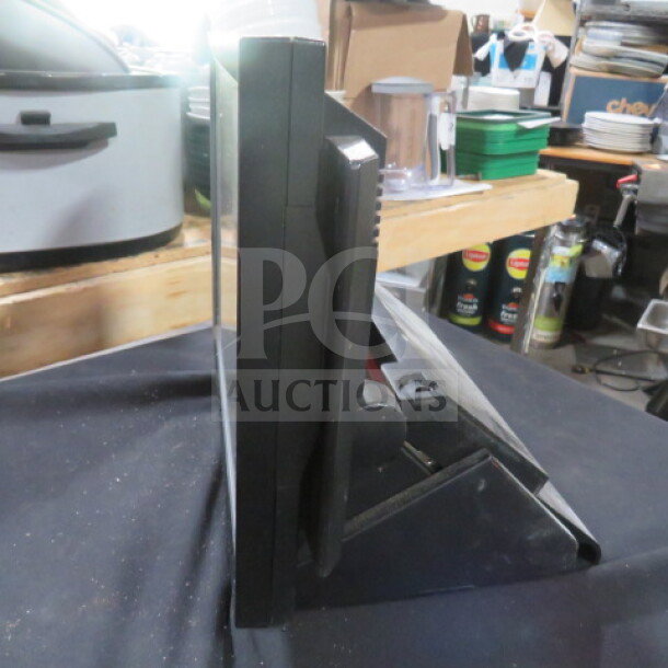 Partner PT-5710 POS All-In-One System, side view, black finish, used condition, sturdy stand.