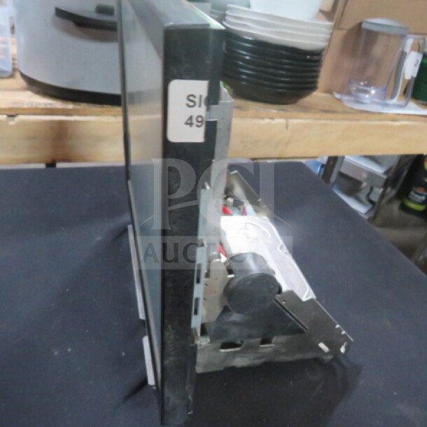 Partner POS All-In-One System, Model PT-5710, from side view showing screen and base. Condition appears used.