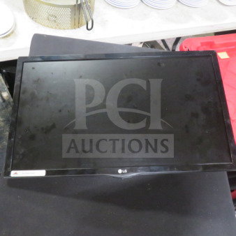 LG Flatscreen Monitor 23MP57HQ-P, sleek design, used condition, minor surface wear, features HDMI and VGA ports.