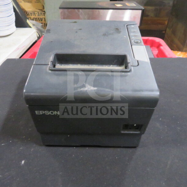Epson TM-T88V printer, black, visible scuffs, button controls on top, brand name on front, used condition.