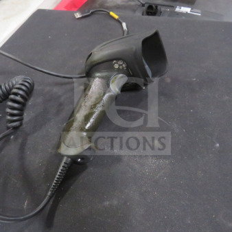 Honeywell Handheld Scanner 1900, black, coiled cord, used condition, USB connection visible.