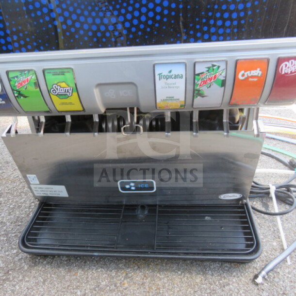 Cornelius 8 Flavor Soda Machine with key. Model KIT-BASE-UNIT-ED175. Features 115 Volt, 24.5"x30"x39".