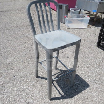 Silver metal bar height chair with slatted backrest and square seat, in used condition.