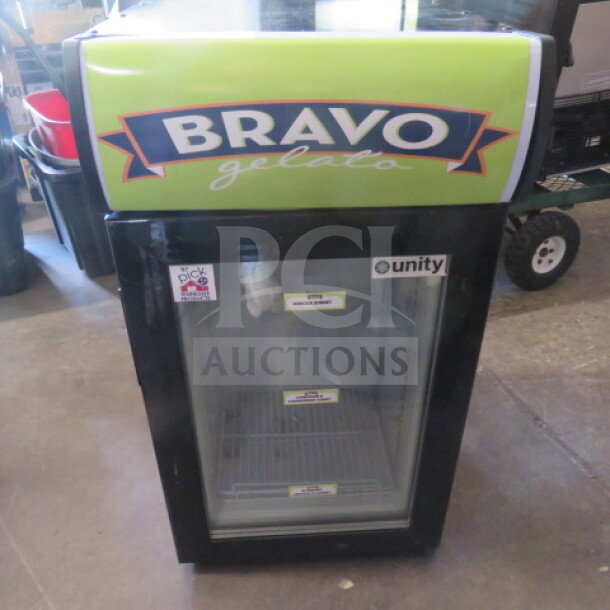 Countertop glass door display freezer, model SD50B, for liquor/ice cream. Features branded "BRAVO gelato" signage. 110-120V.