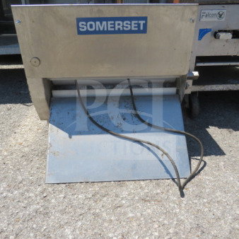 Somerset Dough Roller CDR-2000, 120V, 22.5"x30"x21.5". Features a durable metal frame. Model and brand labels visible.