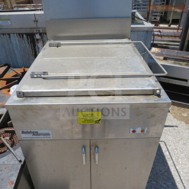 Belshaw Adamatic donut fryer, stainless steel, 25.5x33.5x63.5, with caution label; good used condition.