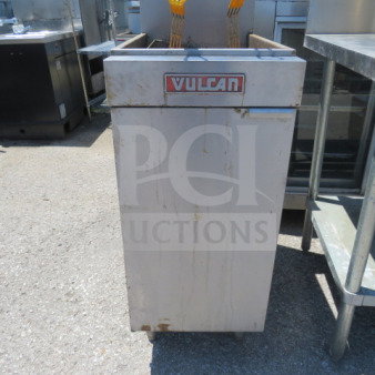 Vulcan natural gas deep fryer, 15.5x30x46 inches, stainless steel, visible wear, front logo, suitable for commercial use.