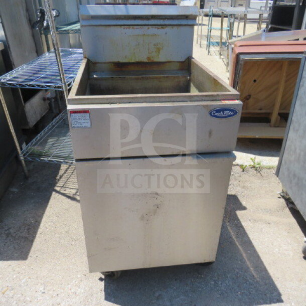 Cook Rite ATFS-75 natural gas deep fryer on casters. Dimensions: 21x31x45 inches. Used condition with visible wear.