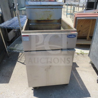 Cook Rite ATFS-75 natural gas deep fryer on casters. Dimensions: 21x31x45 inches. Used condition with visible wear.