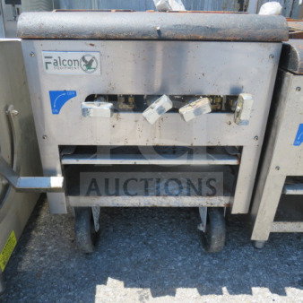 One Falcon Natural Gas 2 Burner on Casters, 18x50x22, stainless steel, used condition, Falcon logo visible.