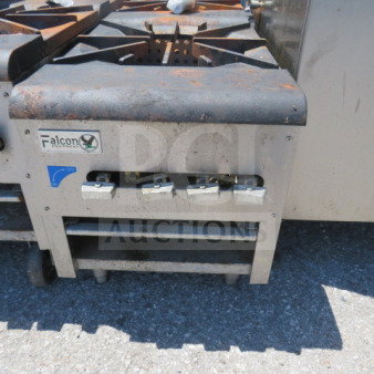 Falcon natural gas 2-burner stove, 18x50x20.5 inches, used condition. Features control knobs, Falcon logo visible.