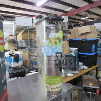 Bunn beverage dispenser with iced tea graphics, stainless steel body, and tap. Used condition.