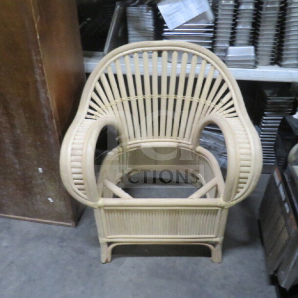 NEW rattan armchair, no seat, natural finish, intricate weave design, sturdy frame. Model: 2XBID.
