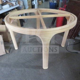 New 60-inch round rattan table without glass top. Notable cracked wood piece. Ideal for repair or customization.