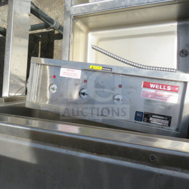 Wells MOD300TDM 3-Well Drop-In Hot Food Well, stainless steel, 43x24x10 inches, visible control panel and labels, 208-240V.