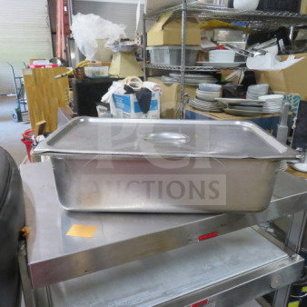 Full-size 6-inch deep hotel pan with lid, stainless steel, used condition, ideal for commercial kitchen use.