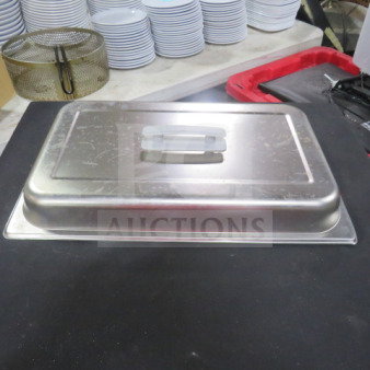 Full-size stainless steel chafer lid with handle, model 4XBID, in used condition. Visible scratches; ideal for catering.