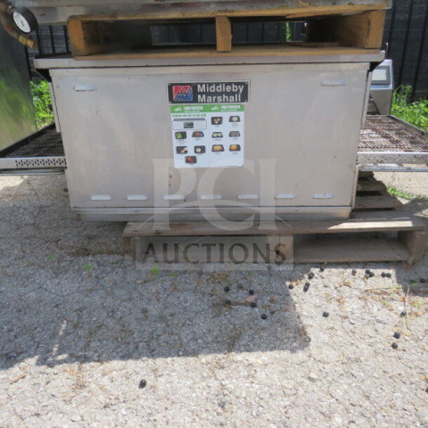 Middleby Marshall PS638G-2 natural gas conveyor oven, double stack unit, on casters, visible branding and control panel.