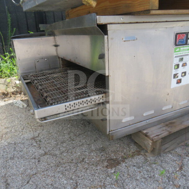 Middleby Marshall PS638G natural gas conveyor oven, double stack, used, on casters, includes 2 ovens, 1 set of legs.