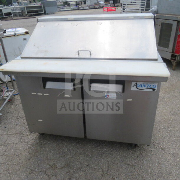 Avantco 2-door refrigerated prep table with cutting board, model 178APT48MHC, on casters, features dual racks, 115V.