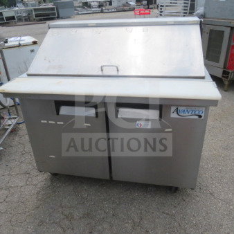 Avantco 2-door refrigerated prep table with cutting board, model 178APT48MHC, on casters, features dual racks, 115V.