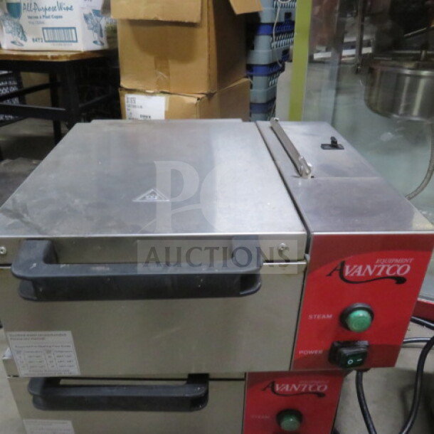 Avantco Steamer, Model 1770S1800$$, 120V. Stainless steel body, dual control knobs. Used condition. Red Avantco branding visible.