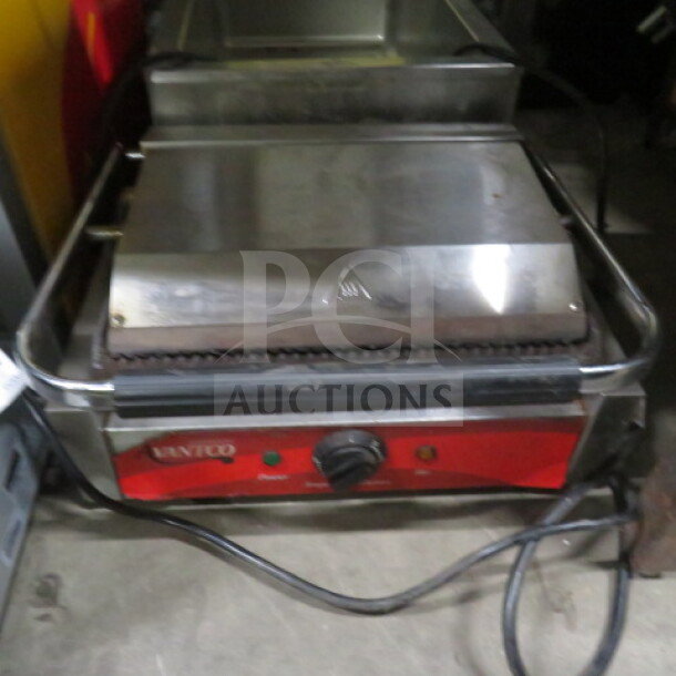 Avantco Panini Press, 120V, 18x15x9, stainless steel, grooved plates, used condition, with adjustable temperature knob.
